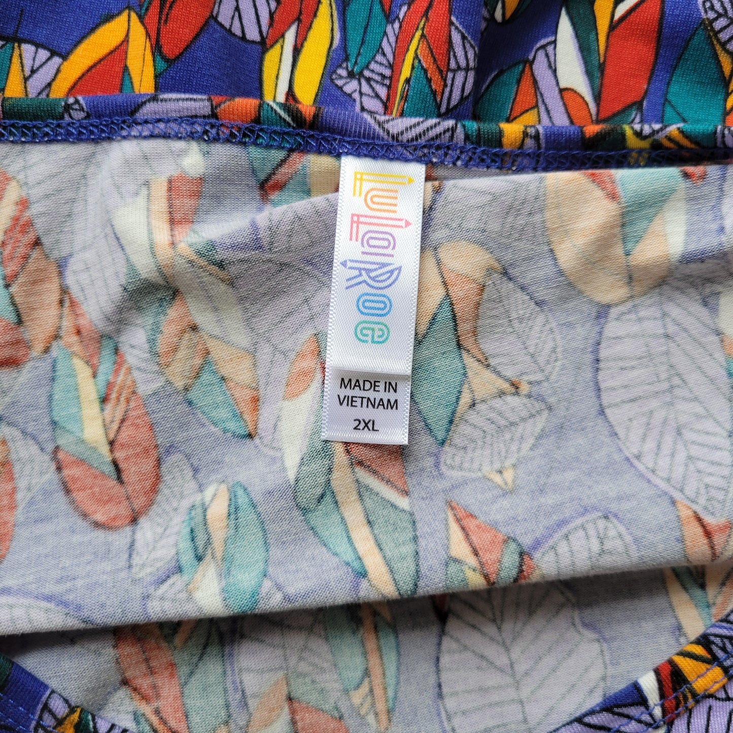 LuLaRoe 2XL Blue Feathers Asymmetric Tunic Top Long Sleeve Stretch Plus A25E