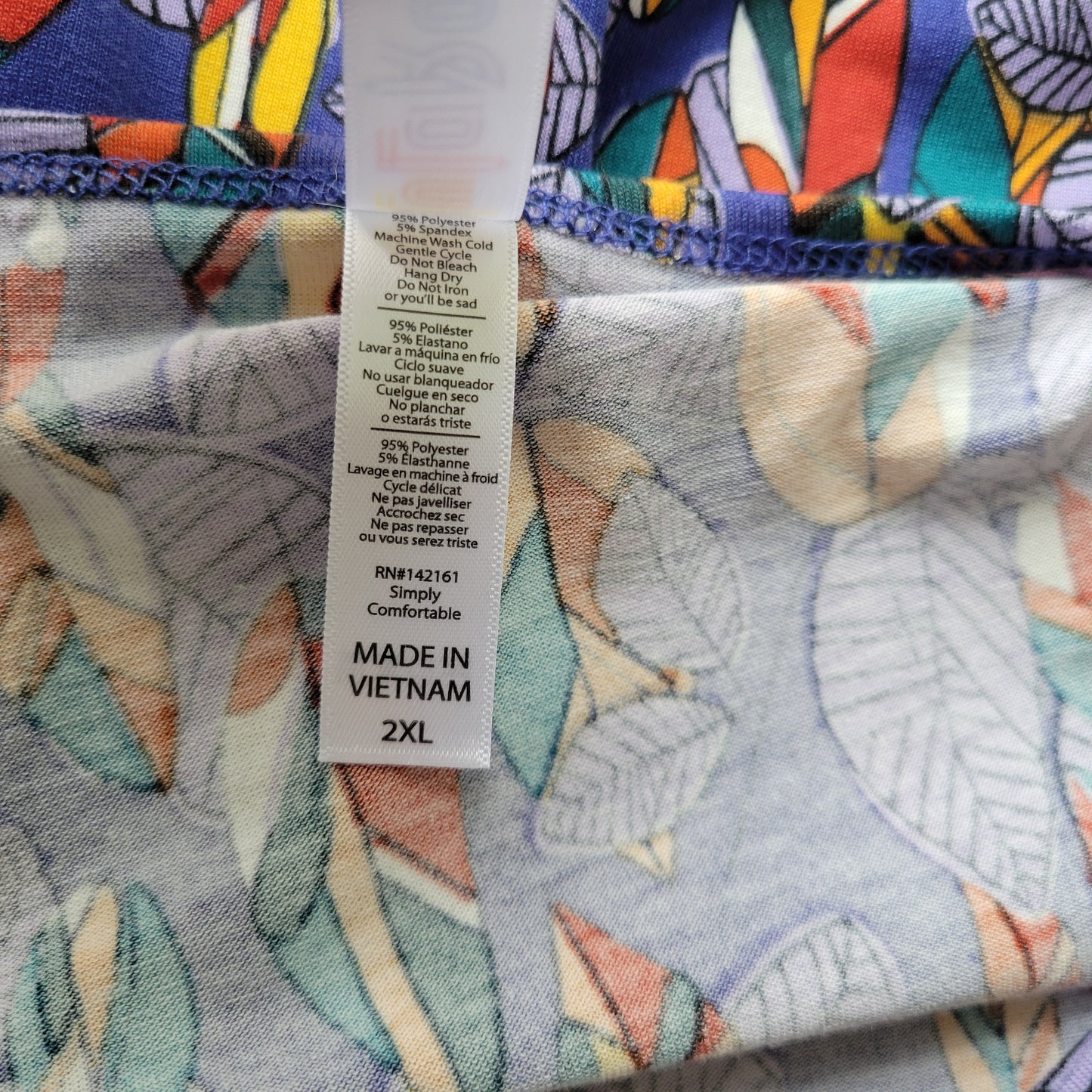 LuLaRoe 2XL Blue Feathers Asymmetric Tunic Top Long Sleeve Stretch Plus A25E