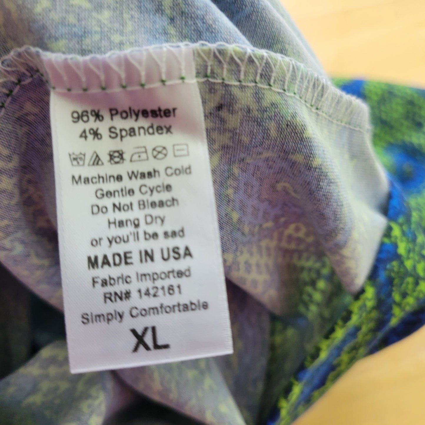 LuLaRoe XL Tunic Top Blue Green Geometric Short Sleeve Crew Neck Stretch GEO130E