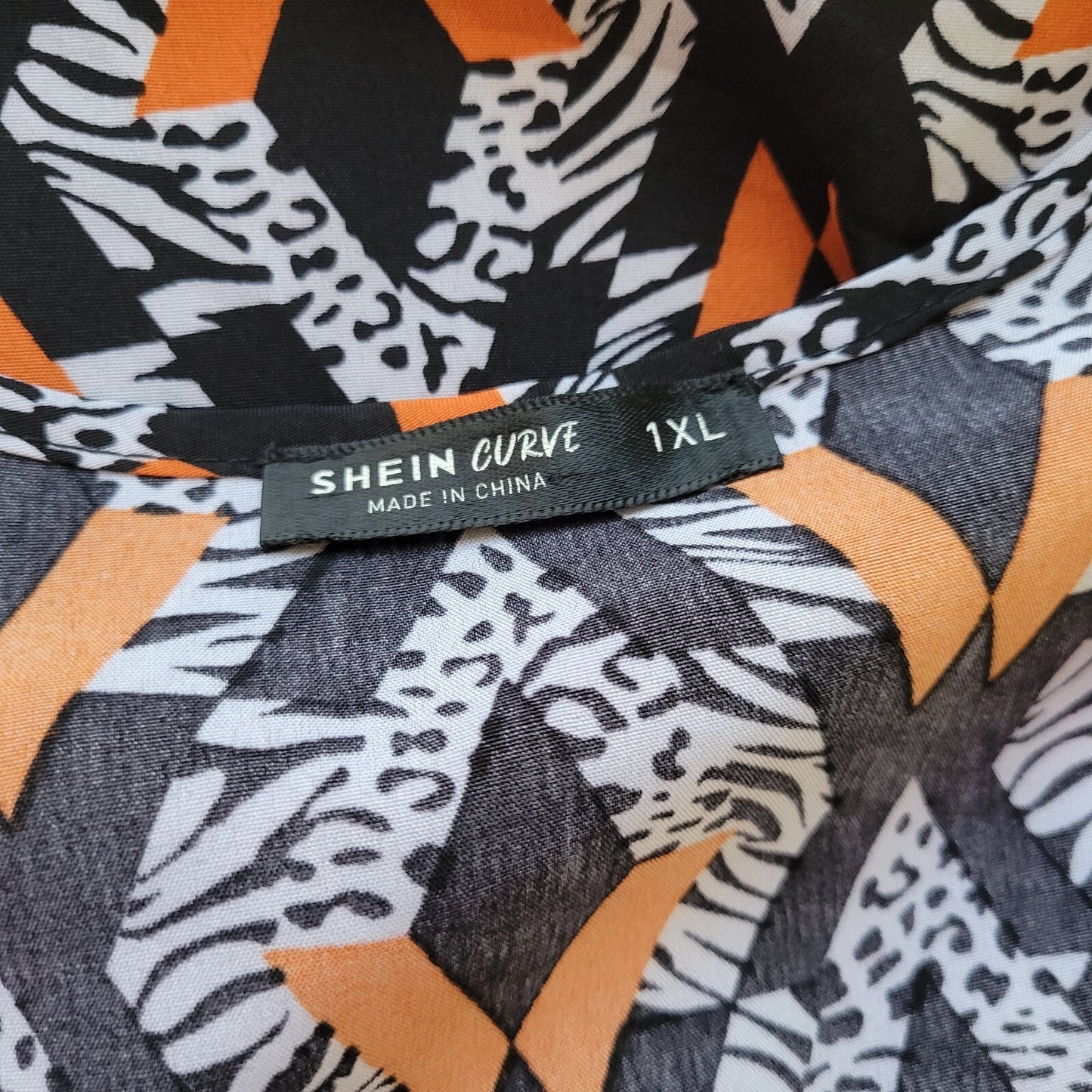 Shein Curve Women's 1XL Orange Black Geometric Smocked Long Sleeve V-Neck Crop